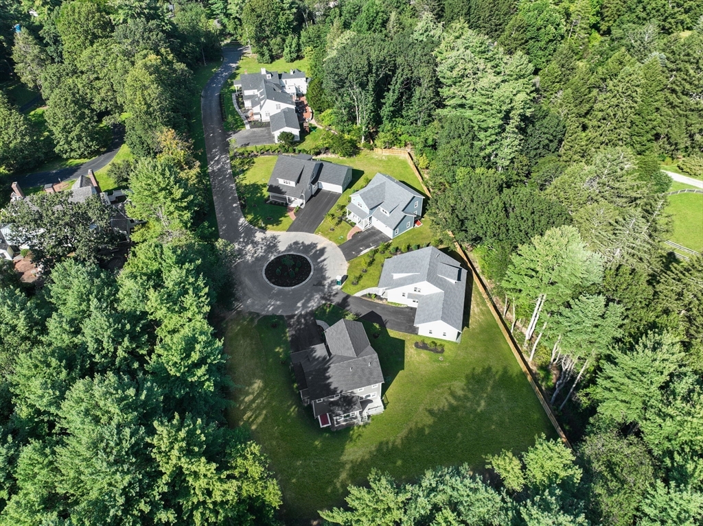1 Emmeline Path, Unit 1 Wayland, MA 01778 - Photo 21 of 22 an aerial view of a house with a yard sitting area and swimming pool