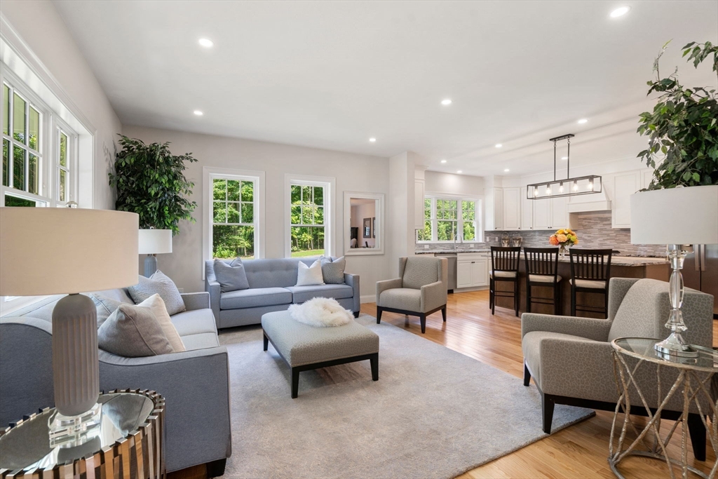 1 Emmeline Path, Unit 1 Wayland, MA 01778 - Photo 3 of 22 a living room with furniture and a large window