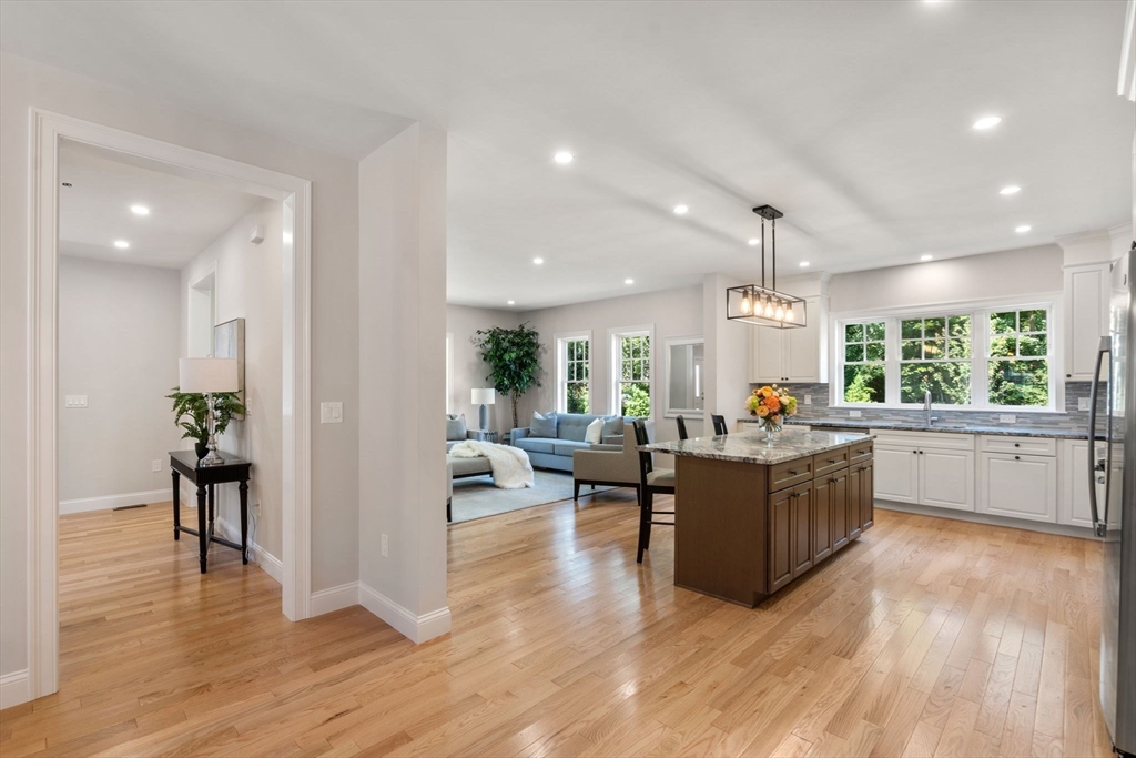 1 Emmeline Path, Unit 1 Wayland, MA 01778 - Photo 8 of 22 a living room with furniture window and wooden floor