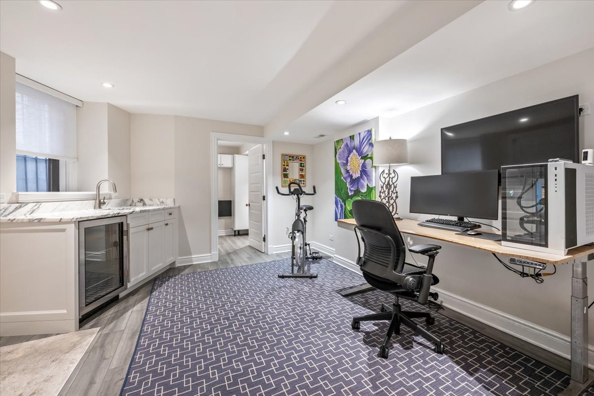 1304 North Ritchie Court Chicago, IL 60610 - Photo 25 of 28 a view of a workspace with furniture and a window