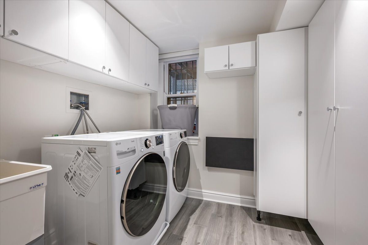 1304 North Ritchie Court Chicago, IL 60610 - Photo 27 of 28 a utility room with dryer and washer