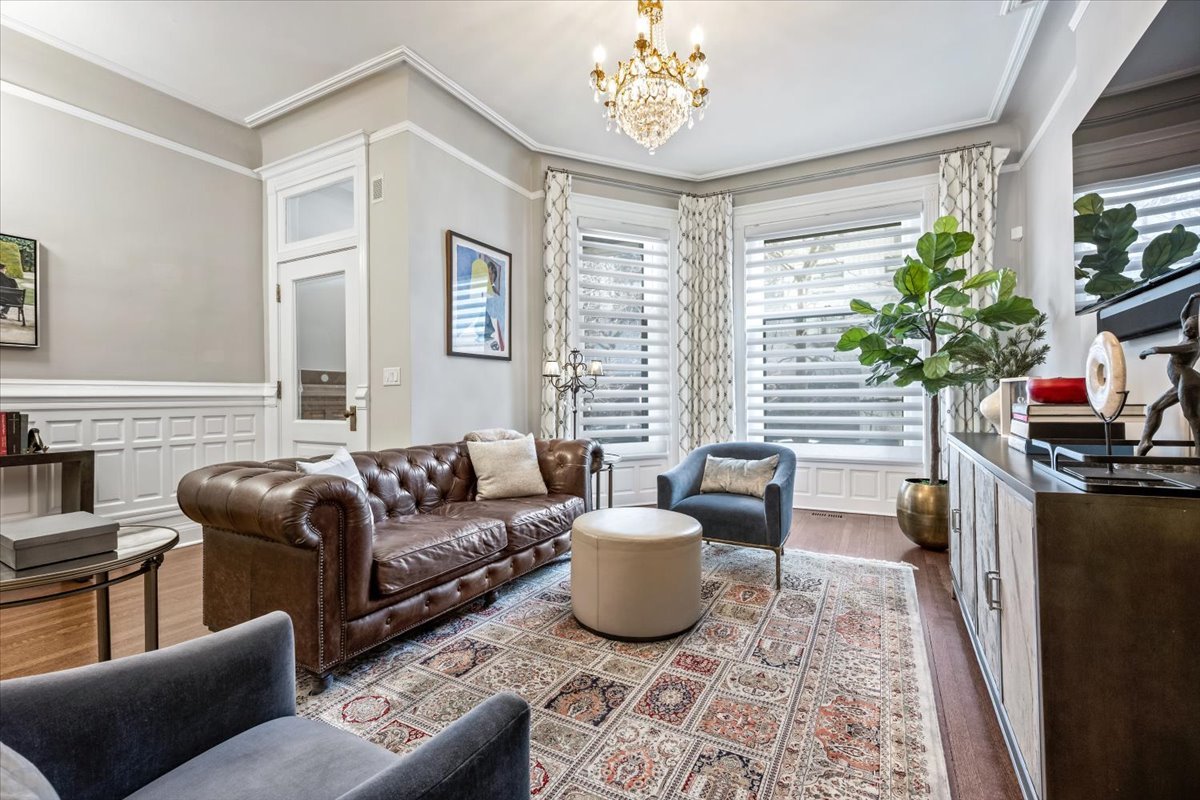 1304 North Ritchie Court Chicago, IL 60610 - Photo 3 of 28 a living room with furniture and a potted plant