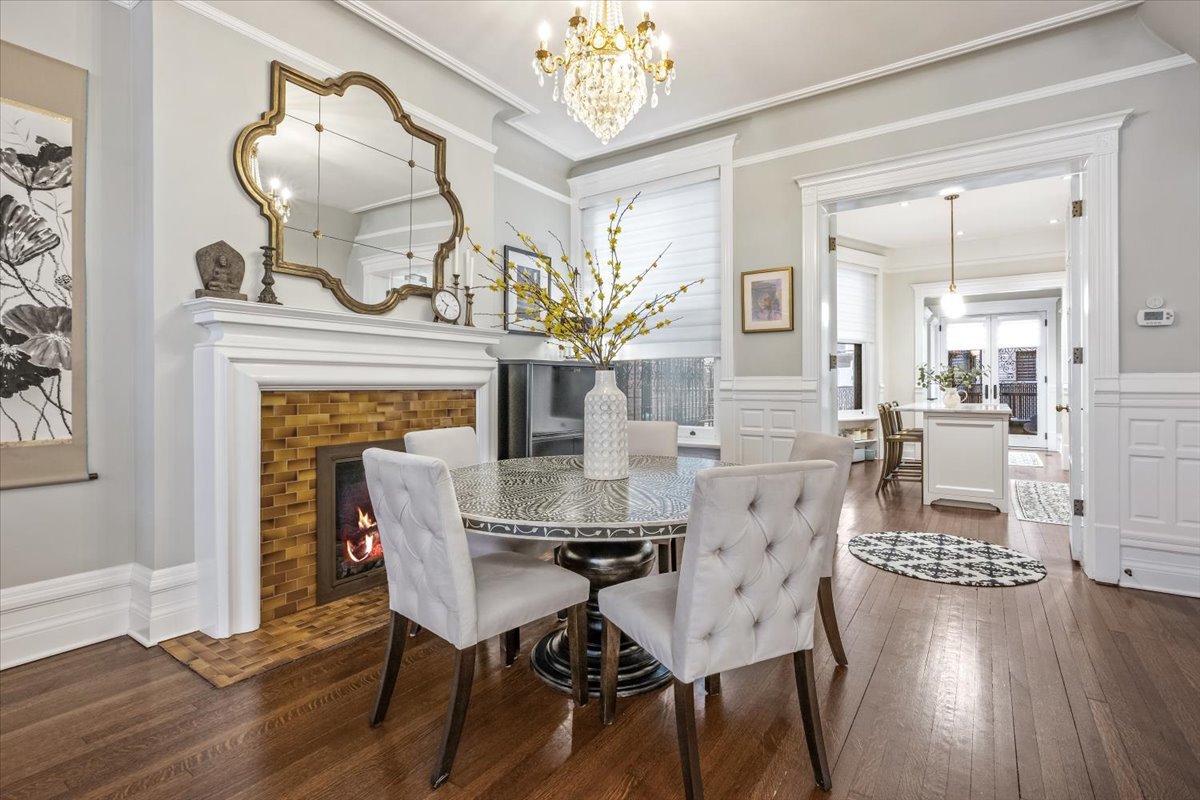1304 North Ritchie Court Chicago, IL 60610 - Photo 5 of 28 a view of a dining room with furniture and wooden floor