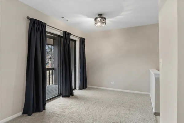 a view of a room with closet area