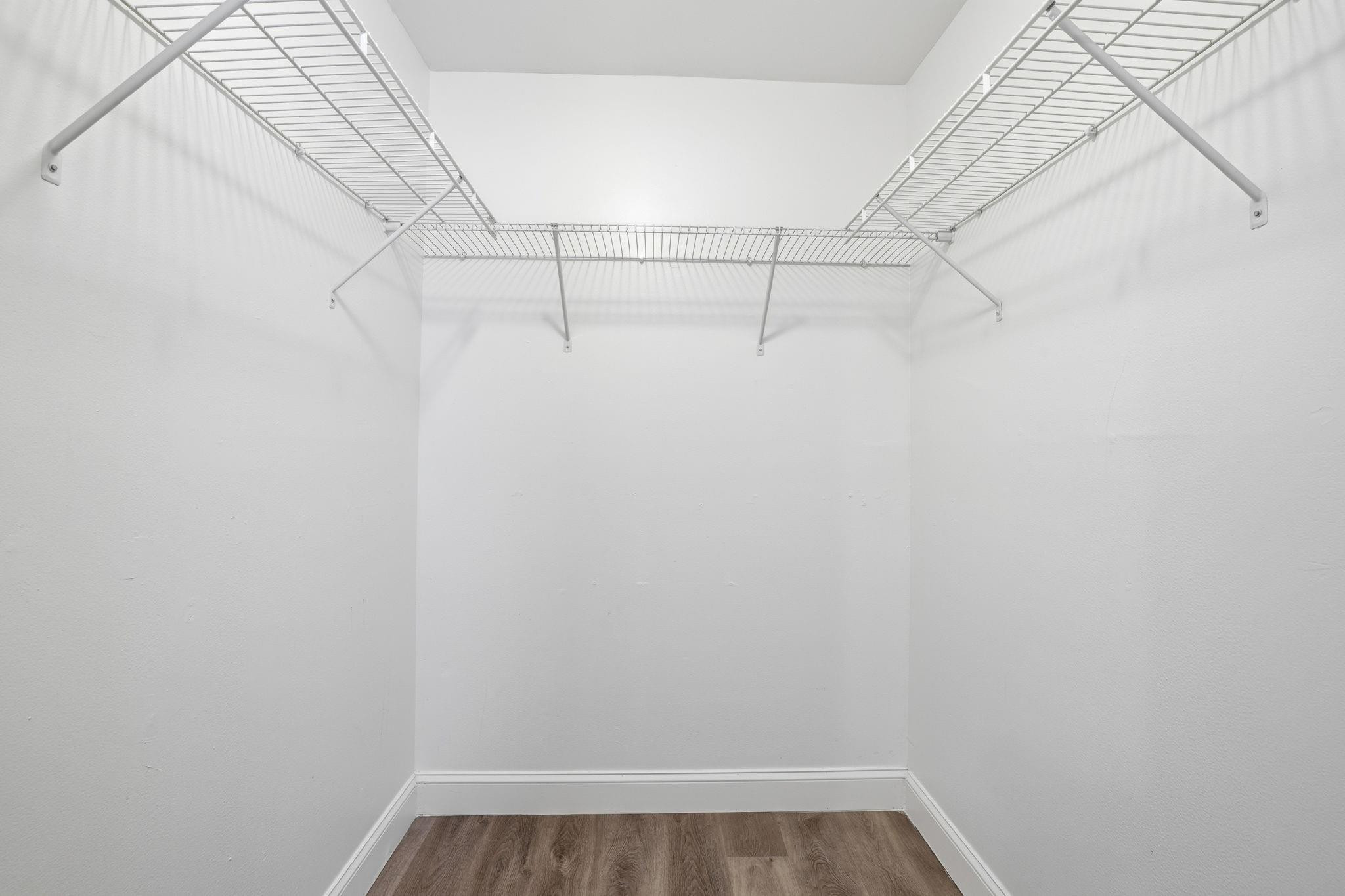 7600 Courtyard Run West Boca Raton, FL 33433 - Photo 23 of 34 a view of a room with racks on the wall