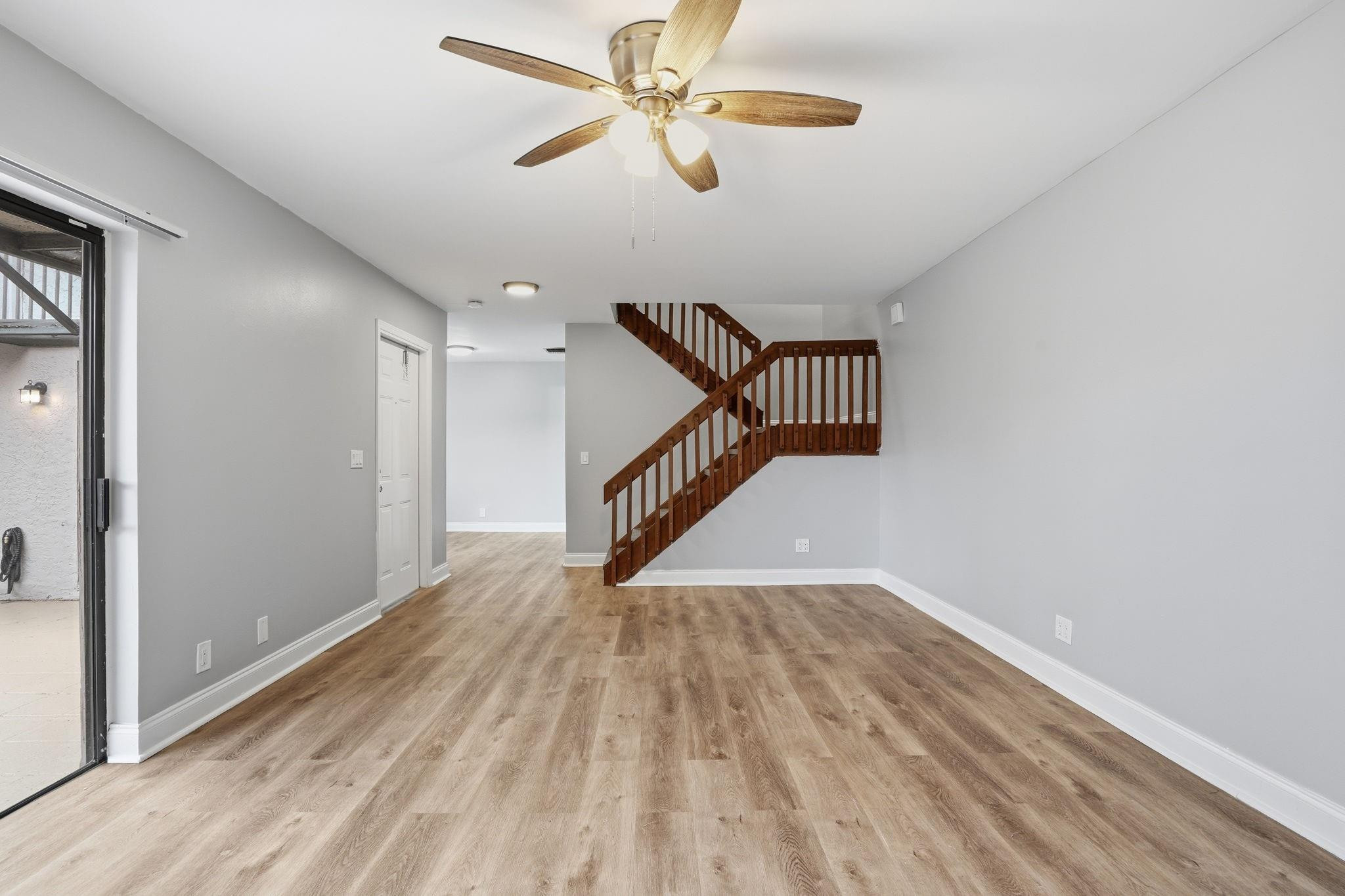 7600 Courtyard Run West Boca Raton, FL 33433 - Photo 4 of 34 a view of a hallway with wooden floor and entryway