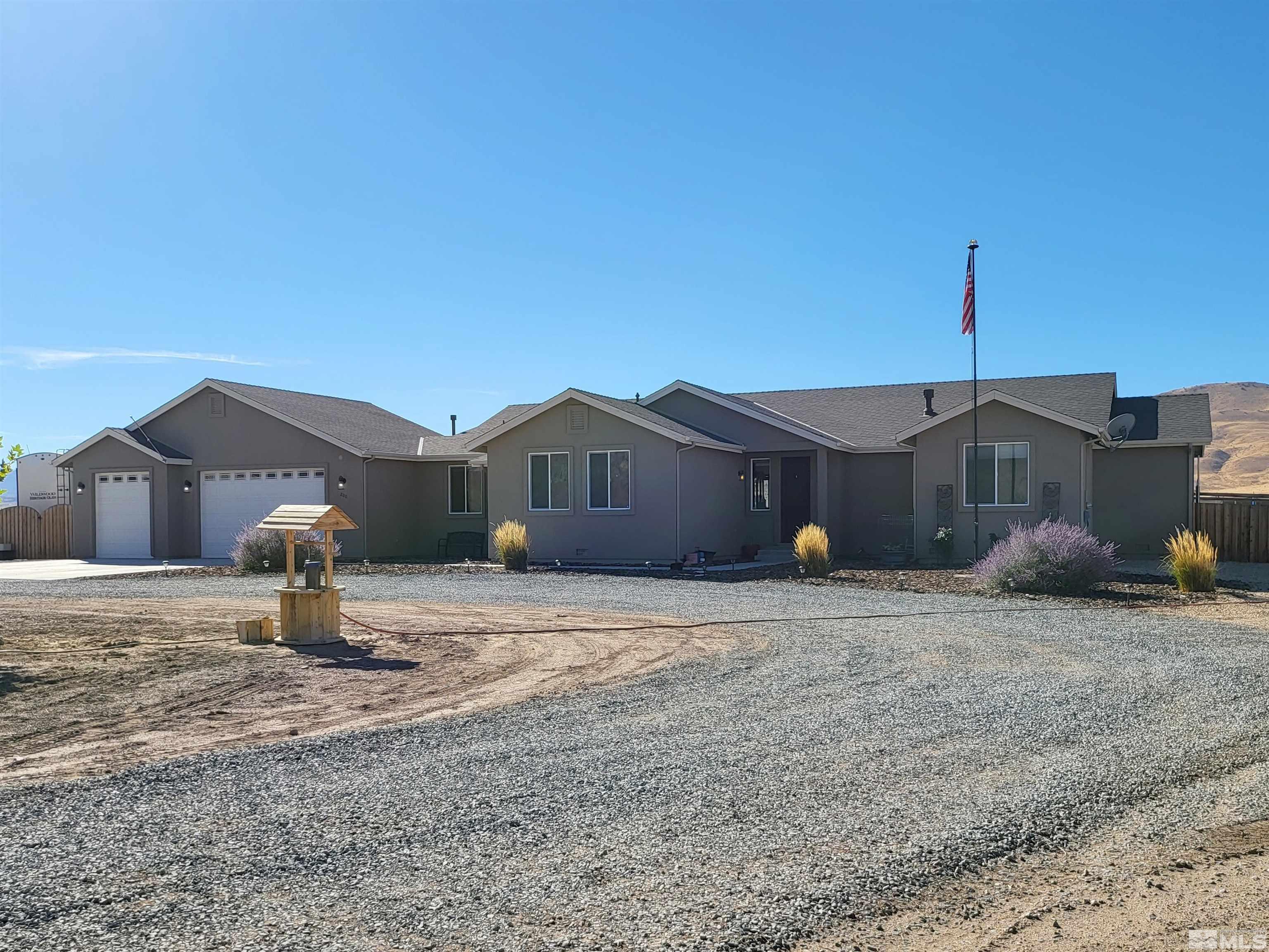 200 Pinto Ranch Court Reno, NV 89510 - Photo 1 of 37 a house view with a garden space