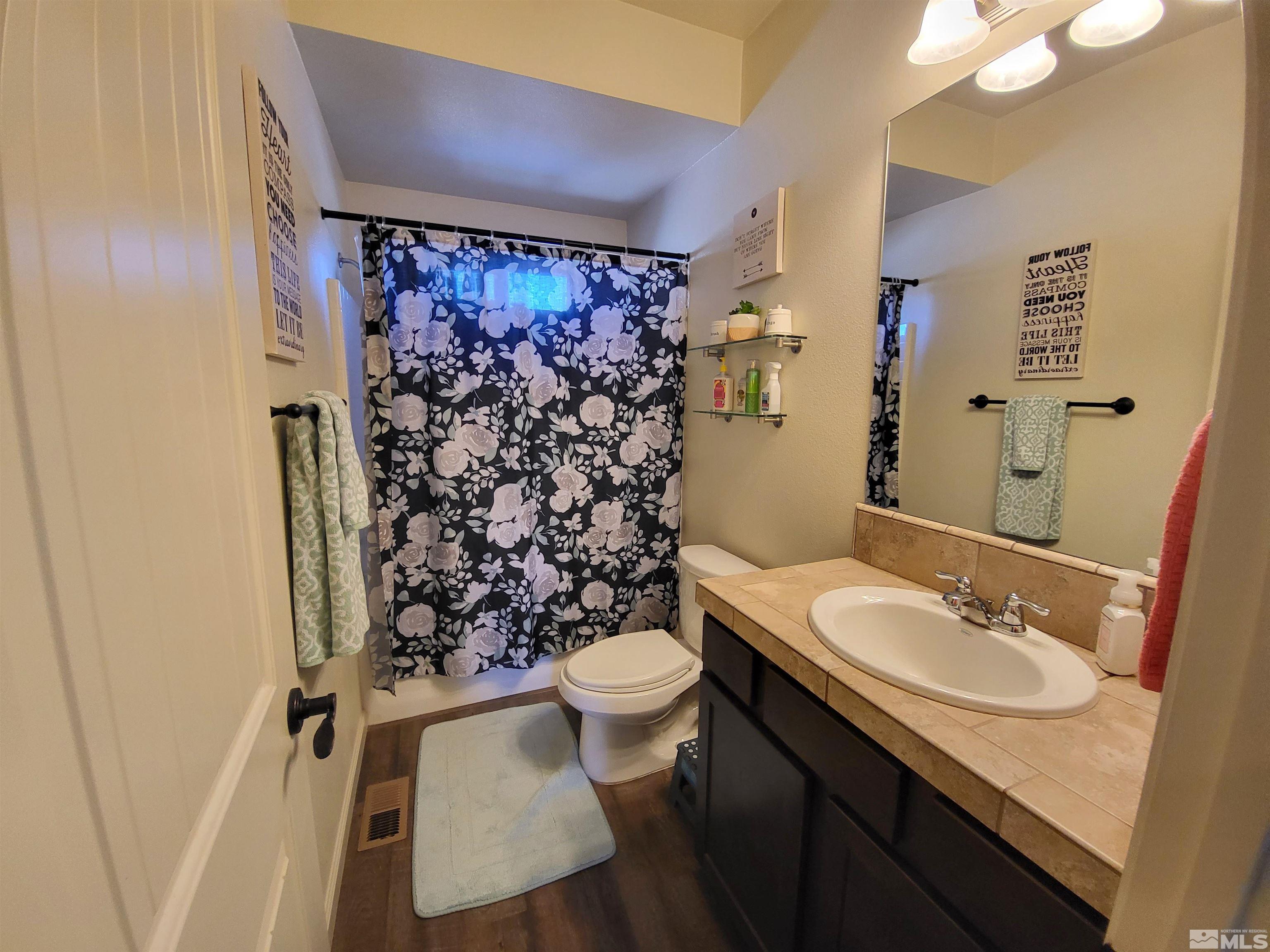 200 Pinto Ranch Court Reno, NV 89510 - Photo 19 of 37 a bathroom with a sink toilet and shower