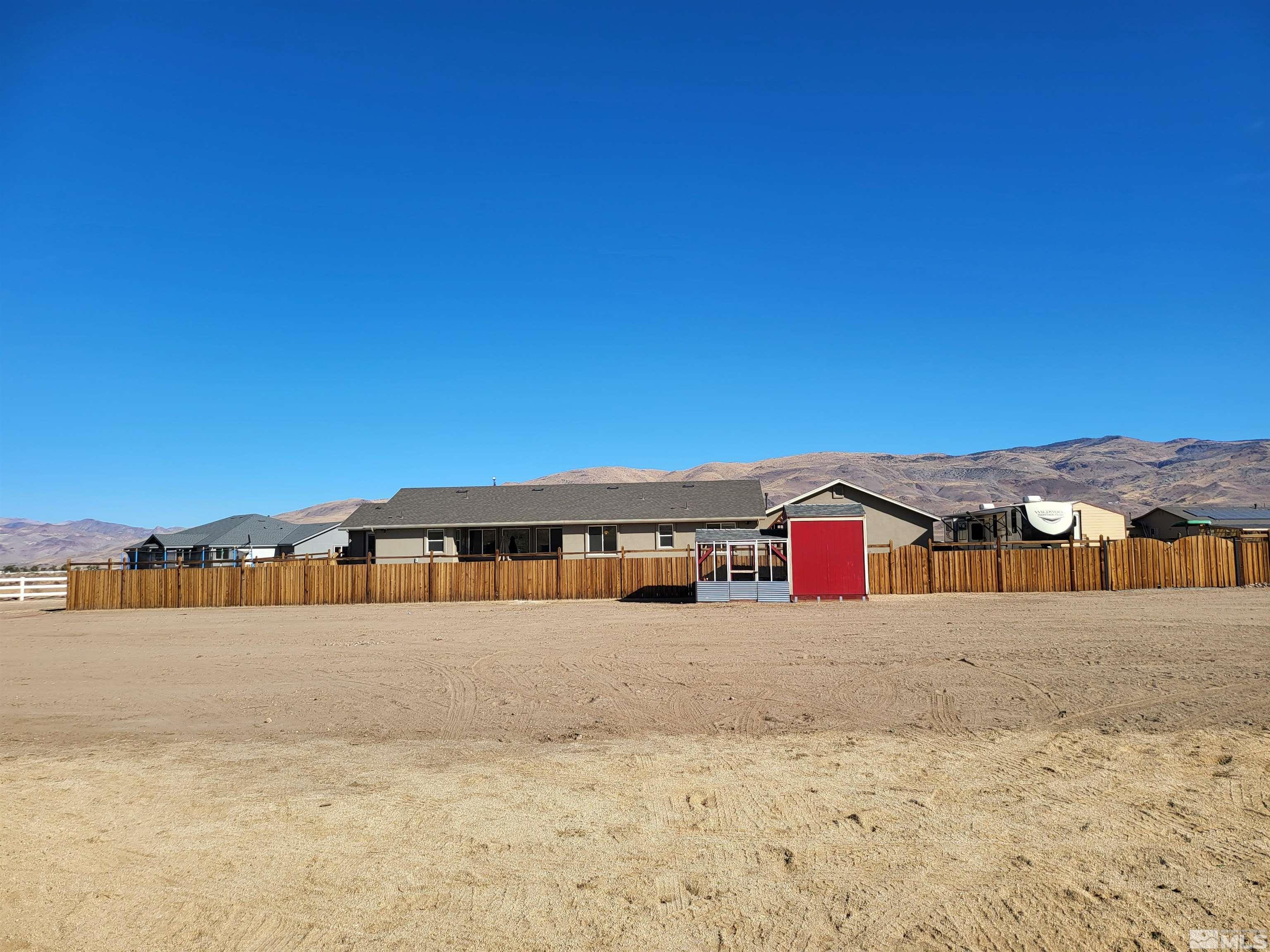 200 Pinto Ranch Court Reno, NV 89510 - Photo 33 of 37 a view of a large building with a yard