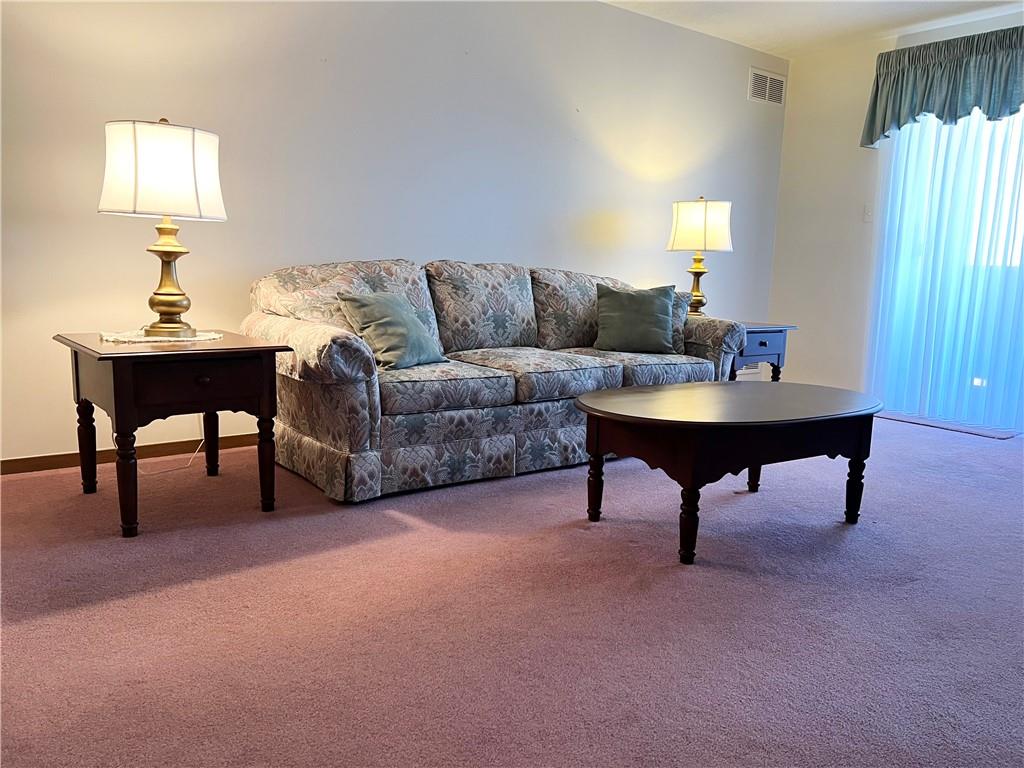 2850 Edgecliff Road, Unit 35 Lower Burrell, PA 15068 - Photo 4 of 27 Living room with sliders to balcony.