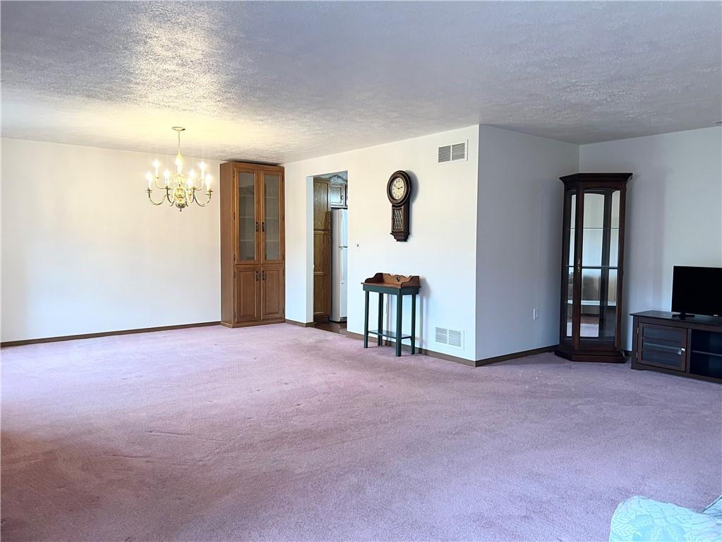 2850 Edgecliff Road, Unit 35 Lower Burrell, PA 15068 - Photo 7 of 27 View of living room and dining room.