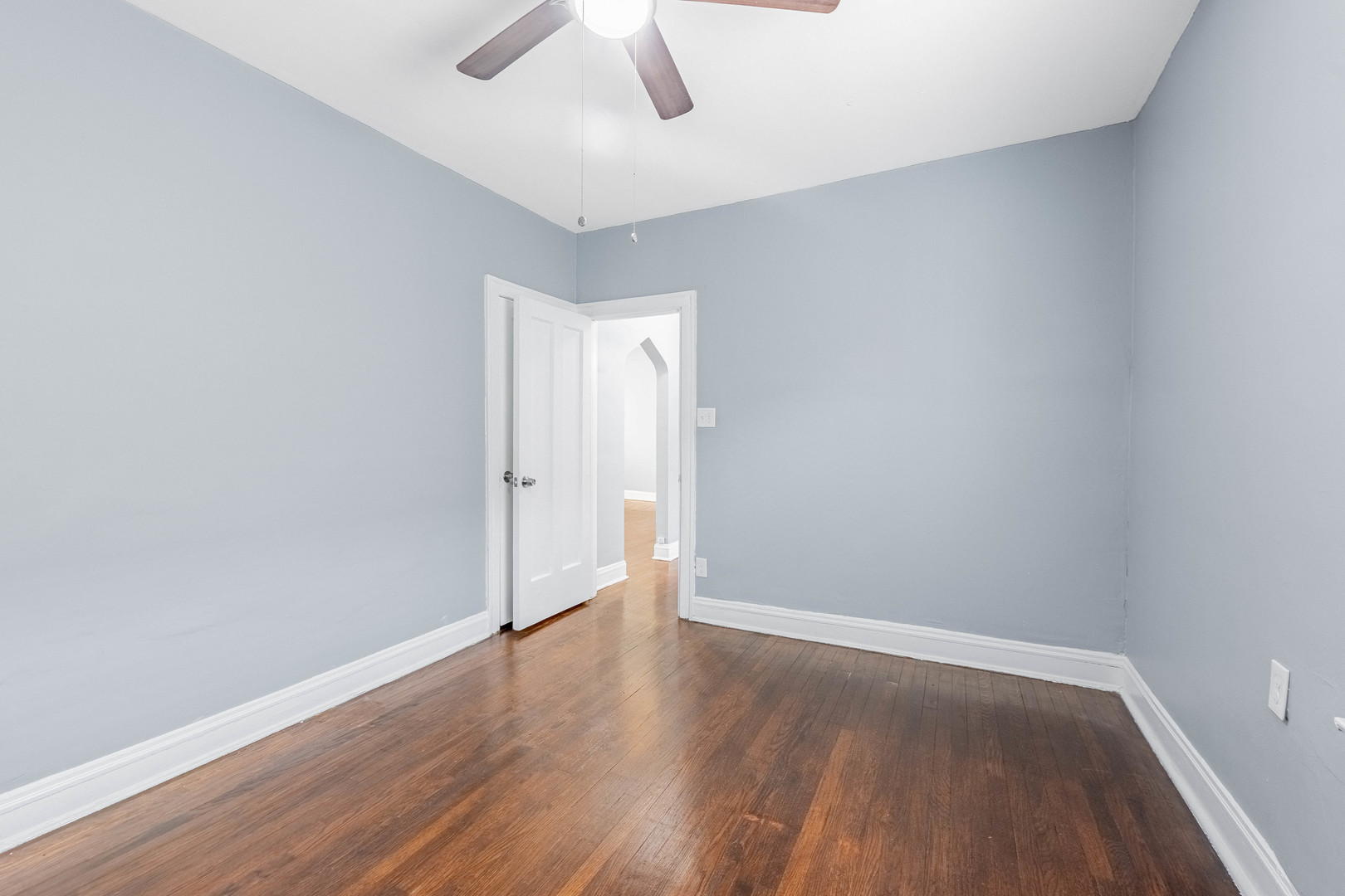 7729 South Laflin Street Chicago, IL 60620 - Photo 19 of 44 wooden floor in an empty room