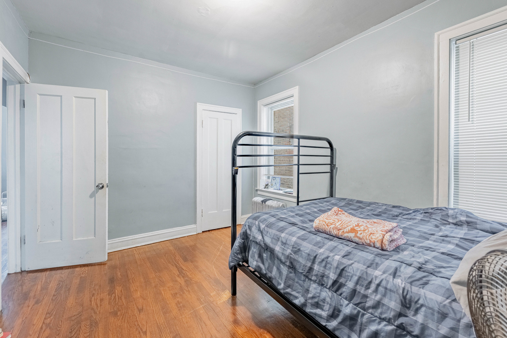 7729 South Laflin Street Chicago, IL 60620 - Photo 30 of 44 a bedroom with a bed and dresser