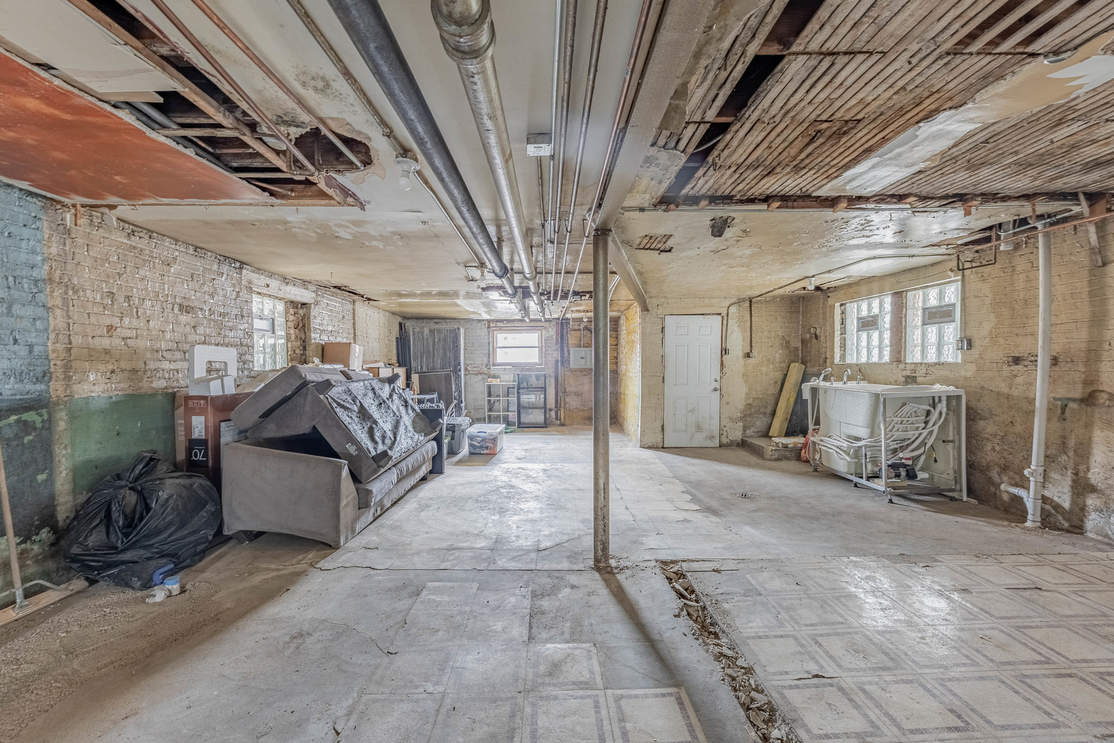 7729 South Laflin Street Chicago, IL 60620 - Photo 40 of 44 a view of a patio with table and chairs