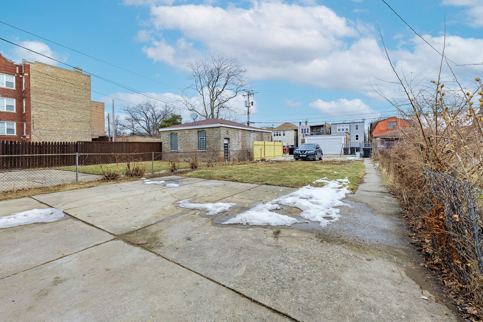 7729 South Laflin Street Chicago, IL 60620 - Photo 42 of 44 a view of a house with a yard