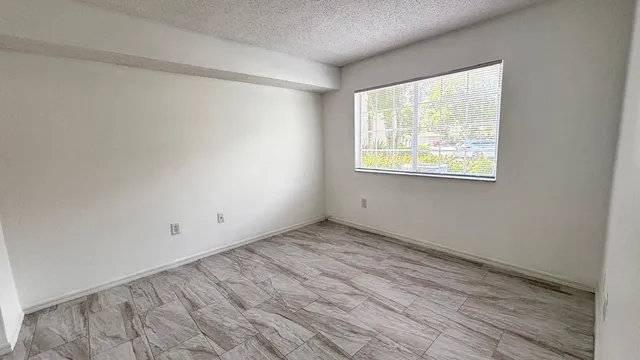 $293,400 | 5025 Wiles Road, Unit 107, Coconut Creek, FL 33073