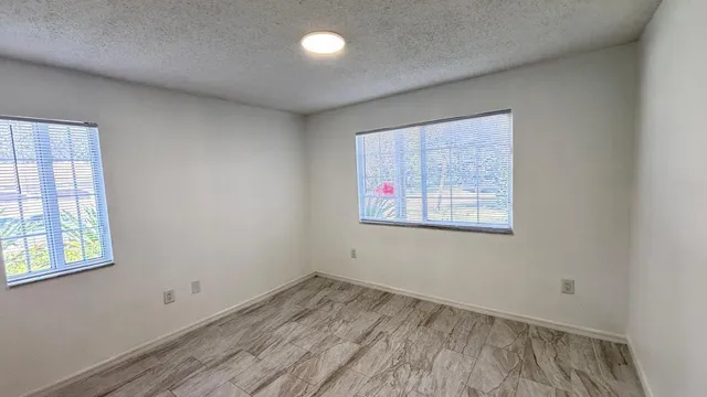 $293,400 | 5025 Wiles Road, Unit 107, Coconut Creek, FL 33073