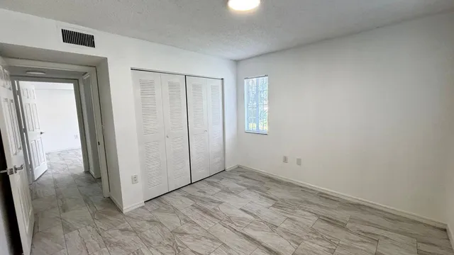 $293,400 | 5025 Wiles Road, Unit 107, Coconut Creek, FL 33073