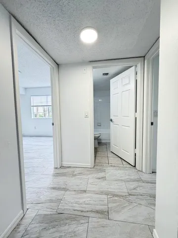 $275,900 | 5025 Wiles Road, Unit 107, Coconut Creek, FL 33073