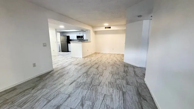 $293,400 | 5025 Wiles Road, Unit 107, Coconut Creek, FL 33073