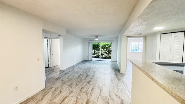 $293,400 | 5025 Wiles Road, Unit 107, Coconut Creek, FL 33073