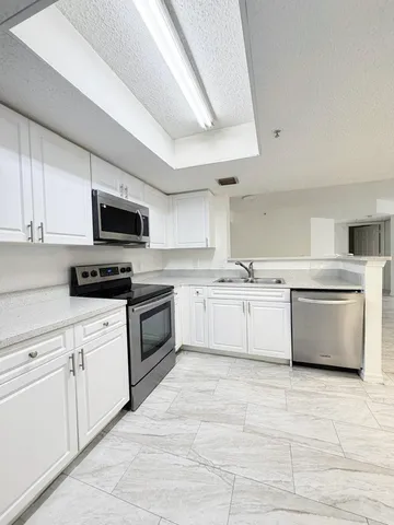 $275,900 | 5025 Wiles Road, Unit 107, Coconut Creek, FL 33073