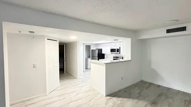 $293,400 | 5025 Wiles Road, Unit 107, Coconut Creek, FL 33073