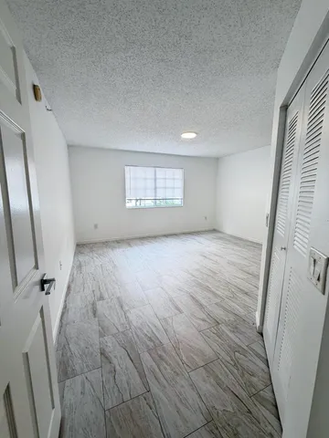 $275,900 | 5025 Wiles Road, Unit 107, Coconut Creek, FL 33073