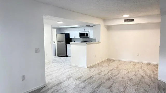 $293,400 | 5025 Wiles Road, Unit 107, Coconut Creek, FL 33073