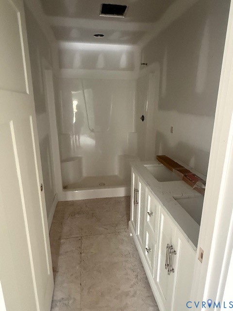 1526 New Town Road Goochland, VA 23063 - Photo 16 of 17 a bathroom with a granite countertop shower and a sink