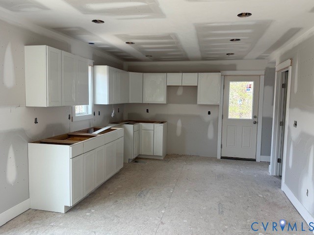 1526 New Town Road Goochland, VA 23063 - Photo 6 of 17 a kitchen that has a sink and a stove in it