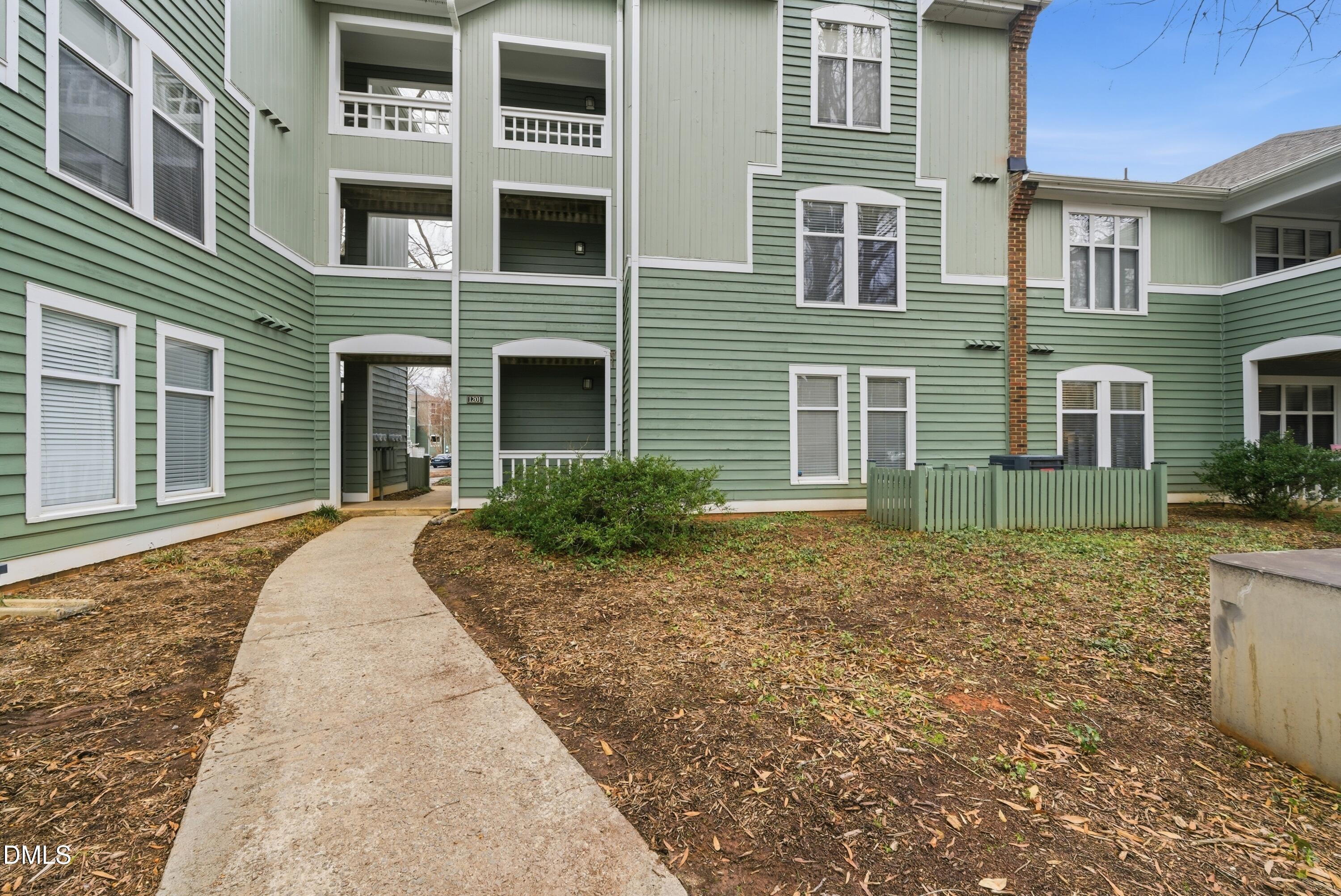1201 Westview Lane, Unit 105 Raleigh, NC 27605 - Photo 4 of 24 a house view with a outdoor space