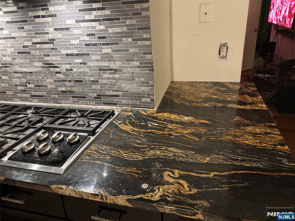 109 Centre Avenue, Unit FIRST Secaucus, NJ 07094 - Photo 2 of 14 a view of stove top oven