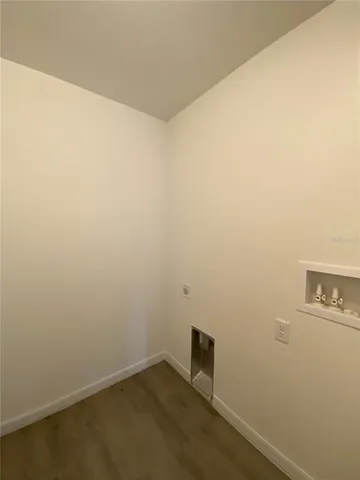 an empty room with a bench