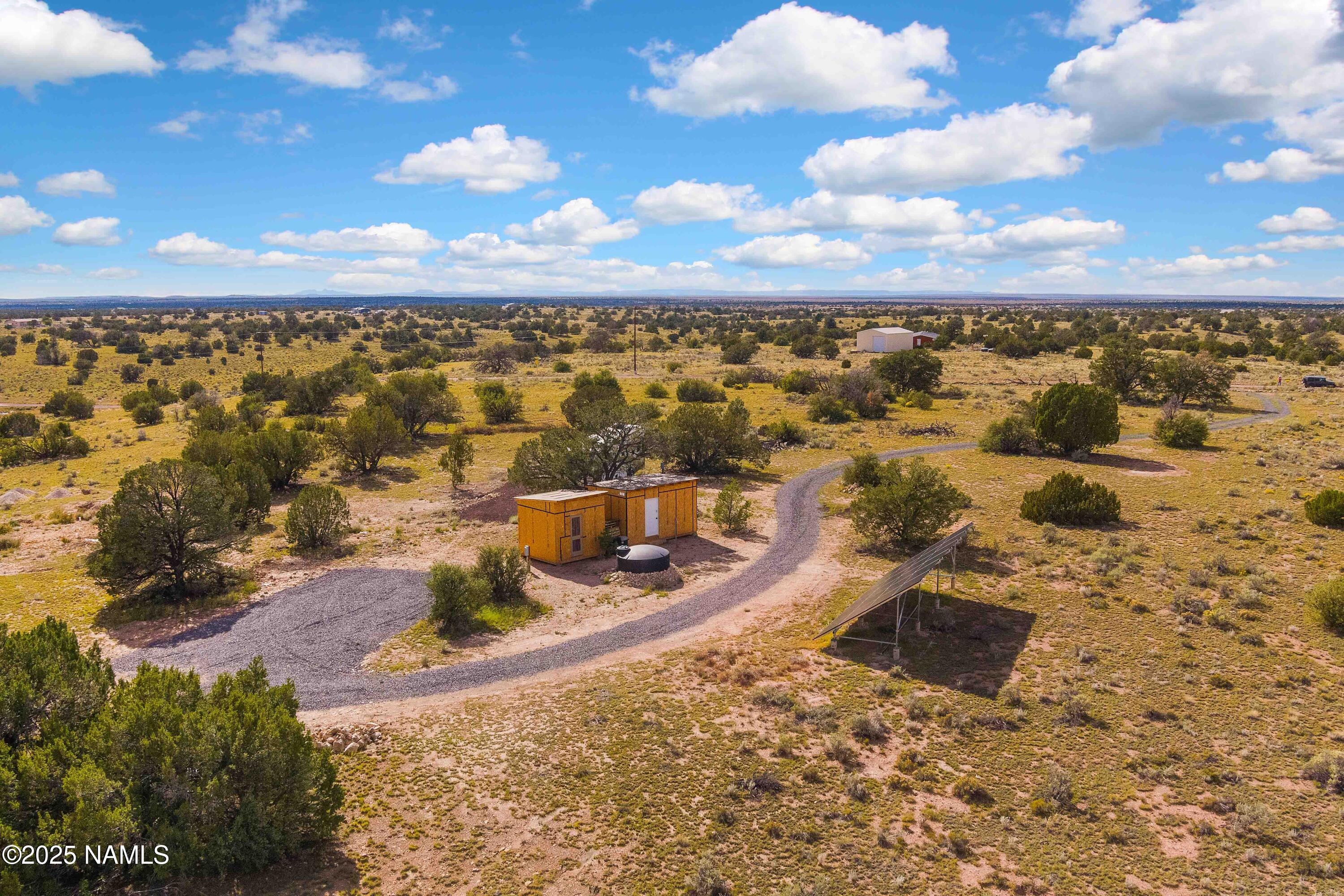 3097 North Peakview Road, Unit LOT A Williams, AZ 86046 - Photo 13 of 36 an aerial view of residential houses with outdoor space