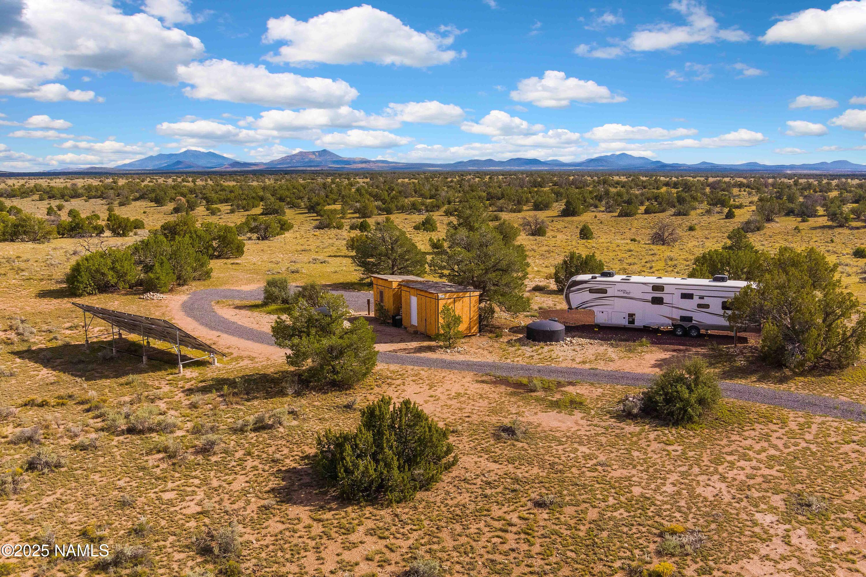 3097 North Peakview Road, Unit LOT A Williams, AZ 86046 - Photo 17 of 36 a view of a lake with a mountain