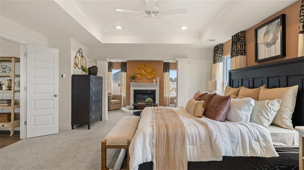 1784 Goodwin Drive Hampton, GA 30228 - Photo 32 of 56 a bedroom with a bed and a fireplace