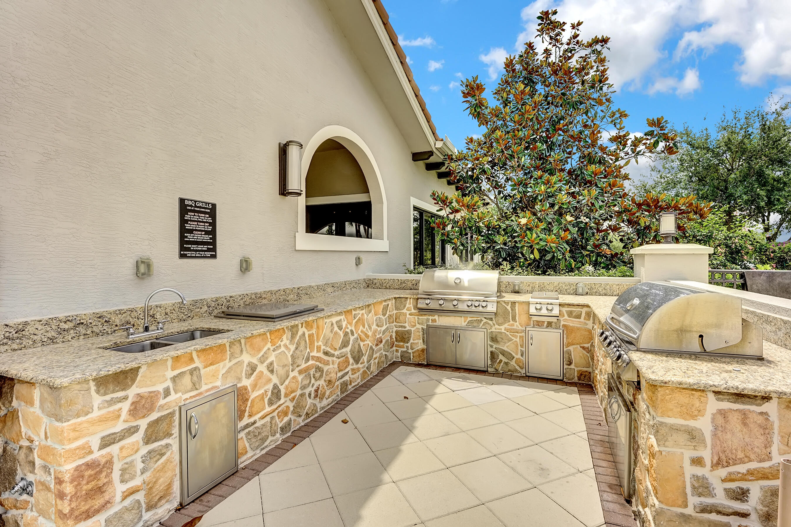 10070 Southwest Dolce Road Port St. Lucie, FL 34986 - Photo 30 of 41 Outdoor Cooking Area