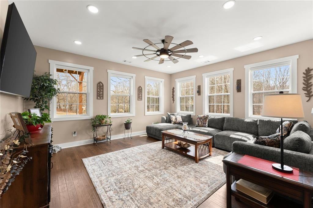 152 Grover Taylor Road Demorest, GA 30535 - Photo 17 of 68 a living room with furniture and a large window