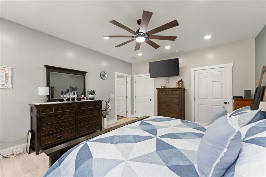 152 Grover Taylor Road Demorest, GA 30535 - Photo 27 of 68 a bed room with a bed and a television