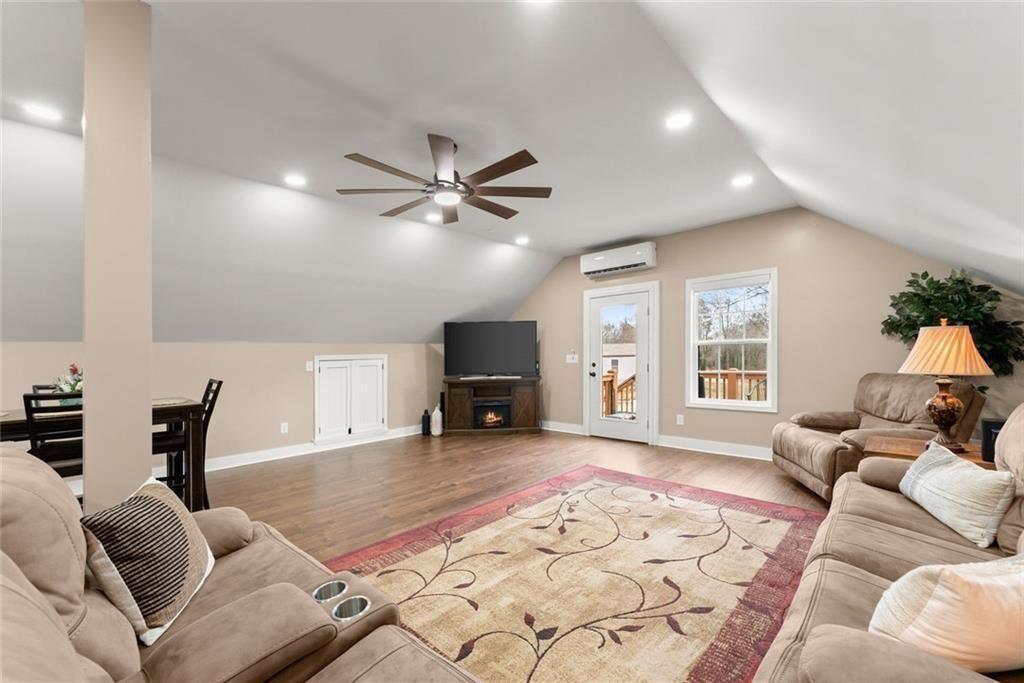 152 Grover Taylor Road Demorest, GA 30535 - Photo 37 of 68 a living room with furniture and a large window