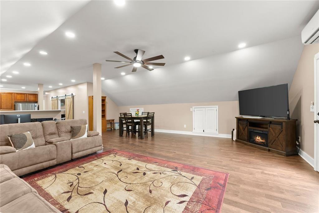 152 Grover Taylor Road Demorest, GA 30535 - Photo 38 of 68 a living room with furniture and a flat screen tv