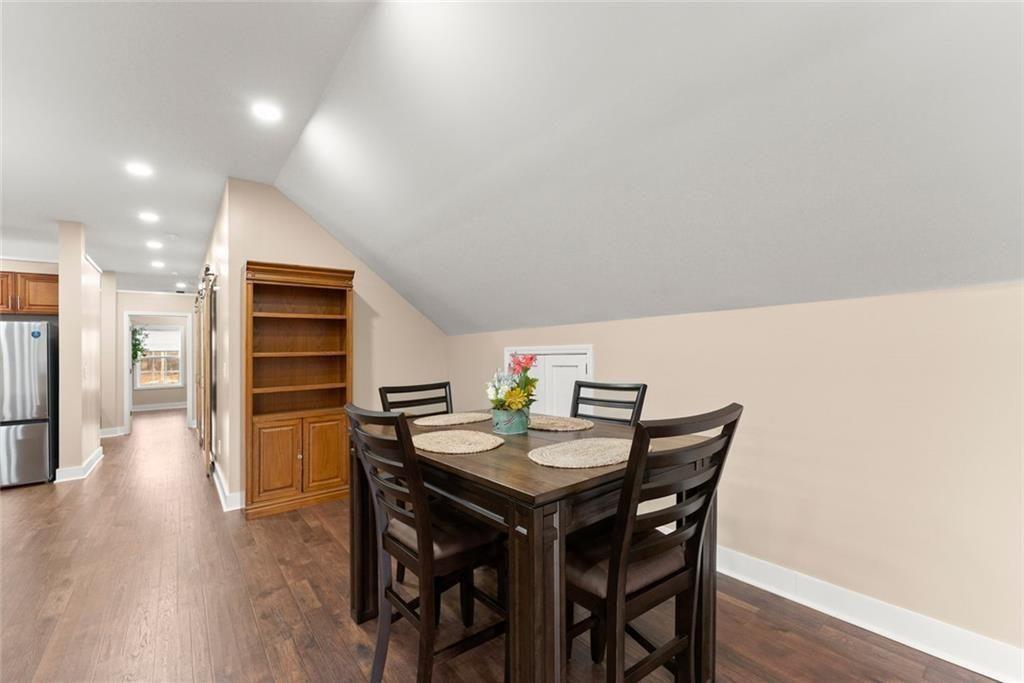 152 Grover Taylor Road Demorest, GA 30535 - Photo 39 of 68 a view of a dining room with furniture and wooden floor