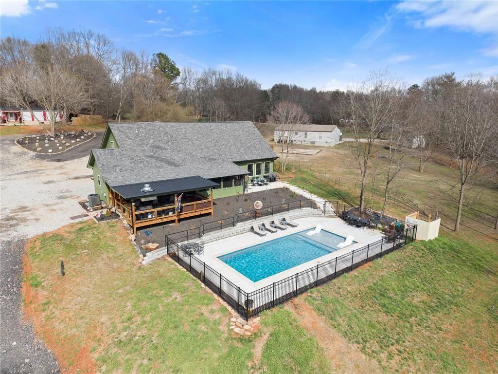 152 Grover Taylor Road Demorest, GA 30535 - Photo 66 of 68 a view of a backyard with a tub