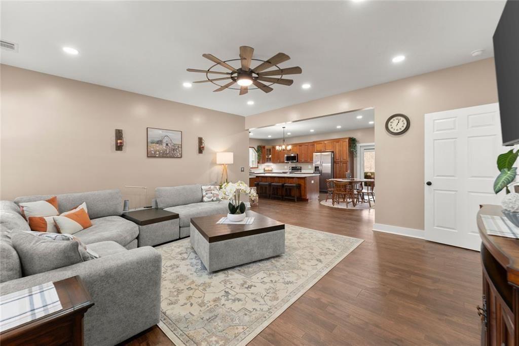 152 Grover Taylor Road Demorest, GA 30535 - Photo 7 of 68 a living room with furniture and a wooden floor