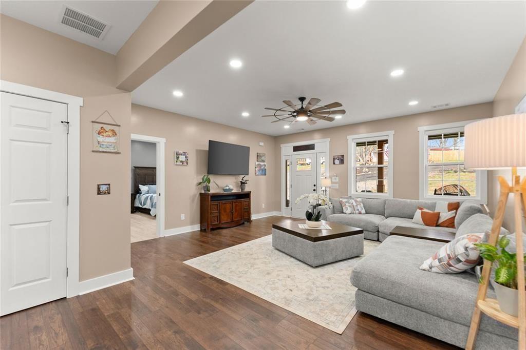 152 Grover Taylor Road Demorest, GA 30535 - Photo 8 of 68 a living room with furniture kitchen view and a wooden floor