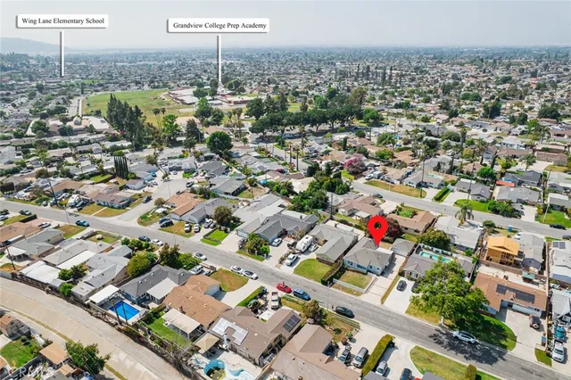 an aerial view of residential building with parking space
