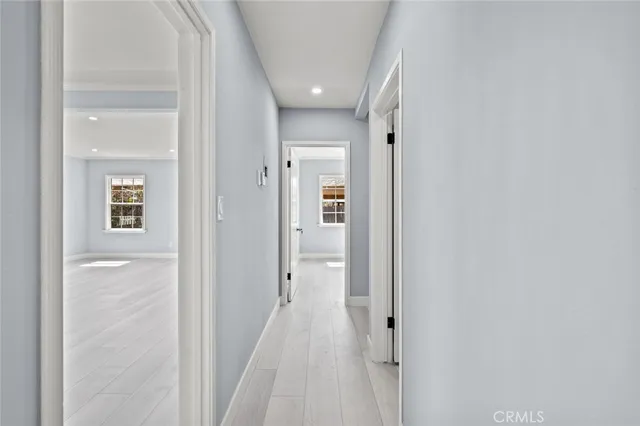 a view of empty room with windows