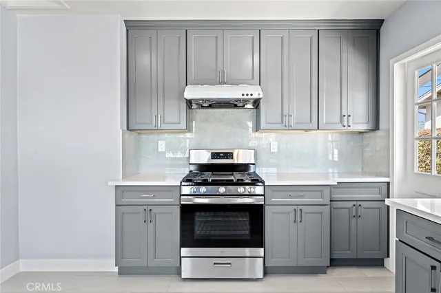 an aerial view of a house with swimming pool