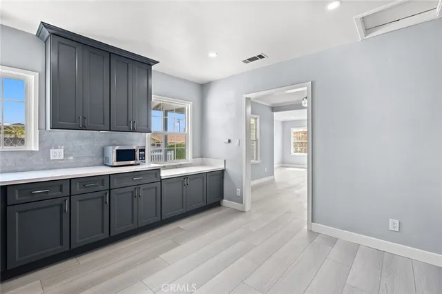 an aerial view of a house with a swimming pool